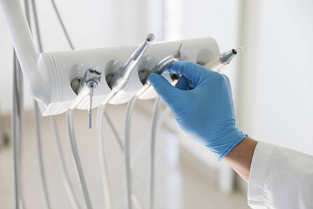 Professional Tooth Extraction technician working in Picayune, MS